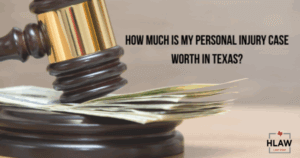 Judge’s gavel resting on a stack of cash symbolizing personal injury compensation in Texas.