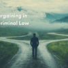 Man standing at a crossroads symbolizing decision-making in Texas criminal plea bargaining process.