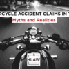Point-of-view of a rider on a Texas road at night with text overlay “Motorcycle Accident Claims in Texas: Myths and Realities,” promoting HLAW’s motorcycle accident guide.
