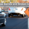 Cars driving through a construction work zone in Dallas-Fort Worth with orange barrels and speed limit signs, illustrating accident liability risks.